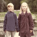 First love, romantic concept, little boy and girl holding hands Royalty Free Stock Photo