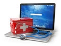 First medical aid or technical support concept. Laptop with firs