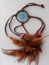 First nations dreamcatcher made by a first nations person in Canada on a white background
