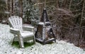 First November snow on the fireside in the backyard