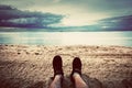 First person perspective of man legs on the beach. Vintage