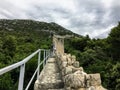 A first person point of view perspective looking directly up the Walls of Ston, in the ancient town of Ston, Croatia.