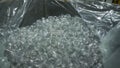 First person view on Bottle. Clip. Industrial production of plastic pet bottles. Rows of empty plastic bottles at