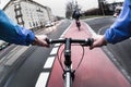 First-person view of cyclist in the city