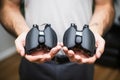 first-person view of holding dual haptic feedback vr controllers