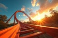 First person view on red roller coaster track looping through forest during sunset. Sky with clouds, sun rays. Motion blur effect Royalty Free Stock Photo