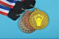 The first place trophy is complemented by a set of medals that includes gold, silver, and bronze, as well as champion and winner Royalty Free Stock Photo