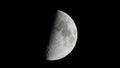 First quarter half moon seen with telescope Royalty Free Stock Photo