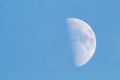 First Quarter Moon in a Blue Sky Royalty Free Stock Photo