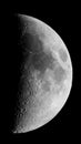 First quarter moon seen with telescope in black and white Royalty Free Stock Photo