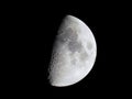 First quarter moon seen with telescope Royalty Free Stock Photo