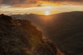 First rays of rising sun on the mountain range Royalty Free Stock Photo