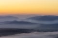 First rays of the rising sun over the mountain