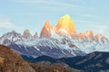 First rays of sun at sunrise over Mount Fitz Roy or Cerro Chalten, Argentina