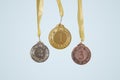 First, second and third prize medals in isolated background. Royalty Free Stock Photo