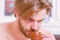 First sip. Every morning with his coffee. Man bearded handsome macho hold cup of coffee. Best time to have your cup of Royalty Free Stock Photo