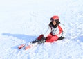 First skiing of tropical girl - falling Royalty Free Stock Photo