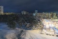 First snow. High-rise buildings near the forested area of the city of Kyiv. Ukraine. The view from the top. Morning landscape Royalty Free Stock Photo