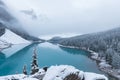 First snow, Morning at Moraine Lake in Banff National Park Alberta Canada Snow-covered winter mountain lake in a winter atmosphere