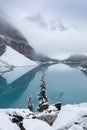 First snow, Morning at Moraine Lake in Banff National Park Alberta Canada Snow-covered winter mountain lake in a winter atmosphere