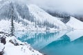 First snow Morning at Moraine Lake in Banff National Park Alberta Canada Snow-covered winter mountain lake in a winter atmosphere. Royalty Free Stock Photo