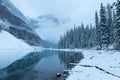 First snow, Morning at Moraine Lake in Banff National Park Alberta Canada Snow-covered winter mountain lake in a winter atmosphere Royalty Free Stock Photo