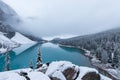 First snow, Morning at Moraine Lake in Banff National Park Alberta Canada Snow-covered winter mountain lake in a winter atmosphere Royalty Free Stock Photo