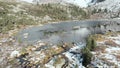 First snow, stones and cold water. Flight over the stream towards the Raduzhnoe lake