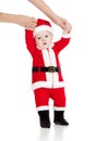 First steps of child baby dressed as Santa claus Royalty Free Stock Photo