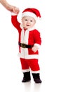 First steps of cute baby boy Santa Claus Royalty Free Stock Photo