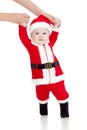 First steps of funny Santa claus baby boy Royalty Free Stock Photo