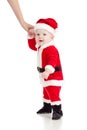 First steps of Santa Claus baby boy. Studio shot Royalty Free Stock Photo