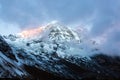 First sunbeams lighting the peak of Mount Annapurna South 7219 m on sunrise, Annapurna Base Camp , Annapurna Conservation Area Royalty Free Stock Photo