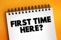 First Time Here? text on notepad, concept background Royalty Free Stock Photo