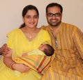 First time Indian (Asian) parent with their baby