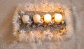 The first two candles burning on a home made advent wreath at the second advent Royalty Free Stock Photo