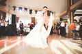 First wedding dance of newlywed couple in restaurant Royalty Free Stock Photo