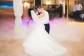 First wedding dance of newlywed couple in restaurant Royalty Free Stock Photo