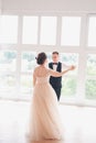 First wedding dance.wedding couple dances on the studio. Wedding day. Happy young bride and groom on their wedding day. Wedding co Royalty Free Stock Photo