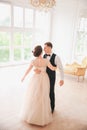 First wedding dance.wedding couple dances on the studio. Wedding day. Happy young bride and groom on their wedding day. Wedding co Royalty Free Stock Photo