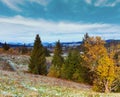 First winter snow and autumn colorful foliage on mountain Royalty Free Stock Photo