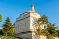 Firuz Agha Mosque with single minaret at the corner of Sultanahmet Square against blue sky in autumn,  a 15th-century Ottoman Royalty Free Stock Photo