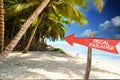 Fiscal paradise with red arrow on tropical island