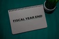 Fiscal Year End write on a book isolated on Office Desk