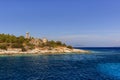 Fiscardo Venetian lighthouse and Byzantine Church. Kefalonia Greece Royalty Free Stock Photo