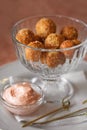 fish appetizer, deep-fried cod balls with shrimp sauce Royalty Free Stock Photo