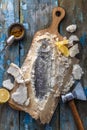 Fish baked in salt with lemon and oil, top view