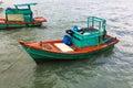 Fish boats are moored to the pie Royalty Free Stock Photo