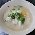 Fish boiled rice. Congee or conjee is a type of rice porridge or gruel popular