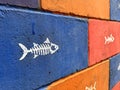 Fish bone graffiti on a brick wall Royalty Free Stock Photo